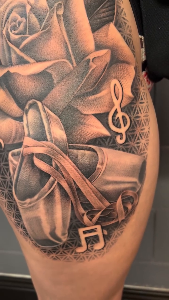 Rose and ballet slippers realism tattoo by Kyle Lopez, Union City, California