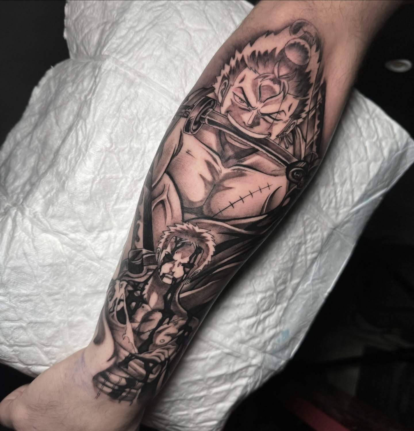 Tattoo by @romerotattoo — anime, black_and_grey