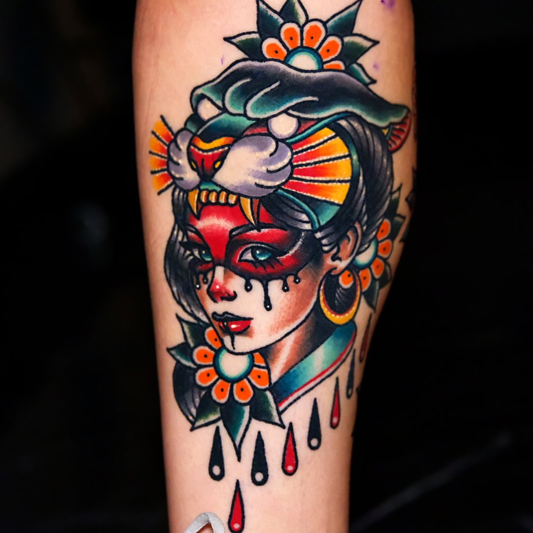 Geisha mask American traditional tattoo on the forearm by Don Boos Tattoos