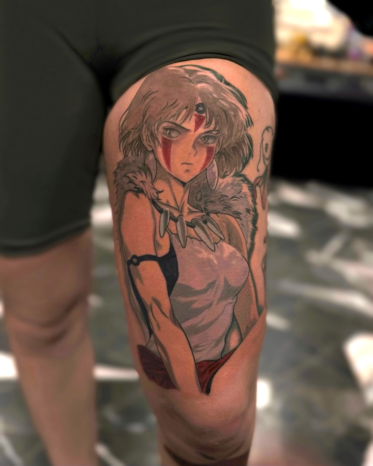 Princess mononoke anime tattoo on the thigh by Suda