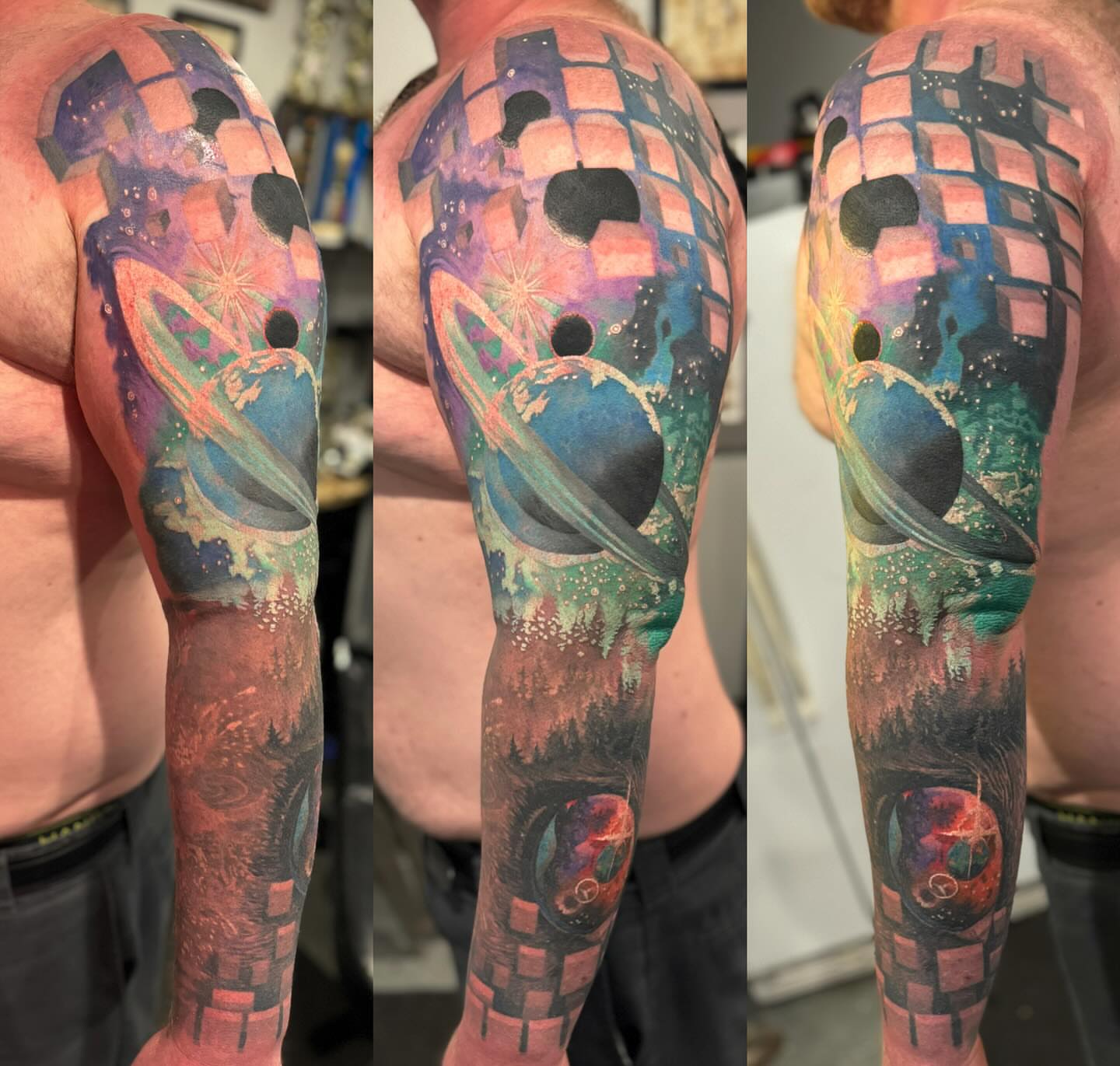 Space-themed surrealism surrealism tattoo on the upper arm by marcus labonne