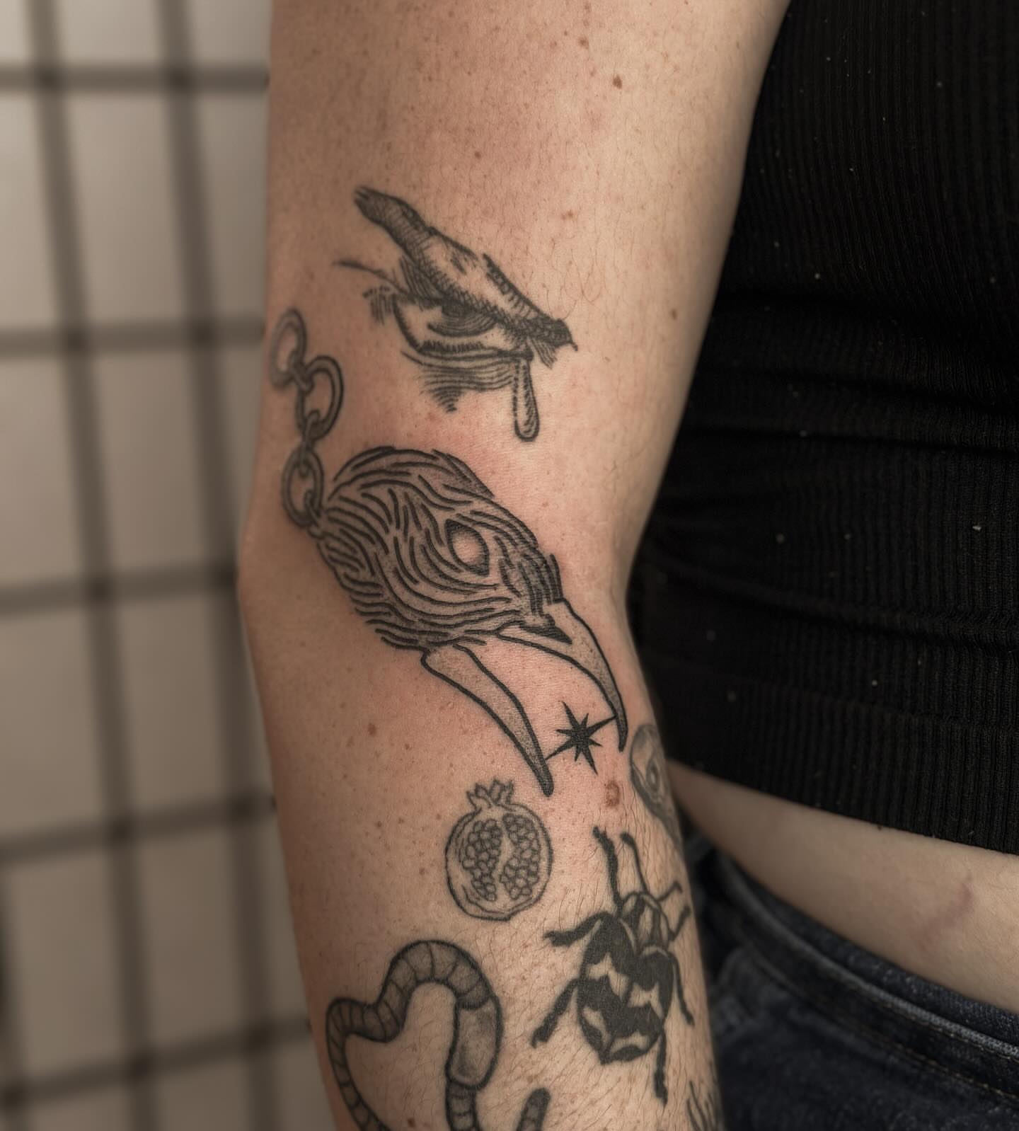 Crow and pomegranate black and grey tattoo on the forearm by πππππππππ β ππππ ππππ ππππ ππππππ ππππππ, Salt Lake City, Utah
