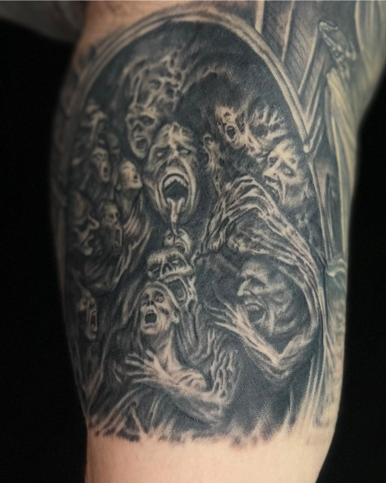 Horror scene realism tattoo on the forearm by James Reed Tattoo artist