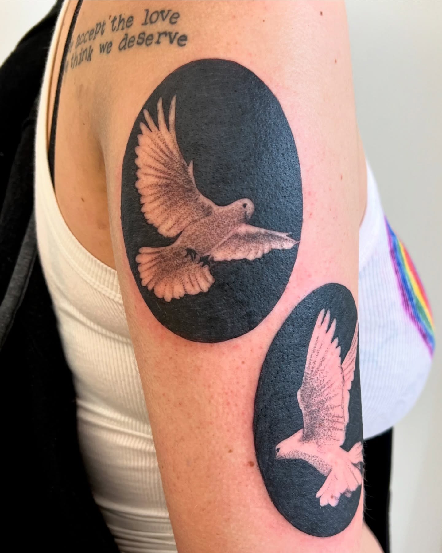 Doves dotwork tattoo on the forearm by Maddy Paige