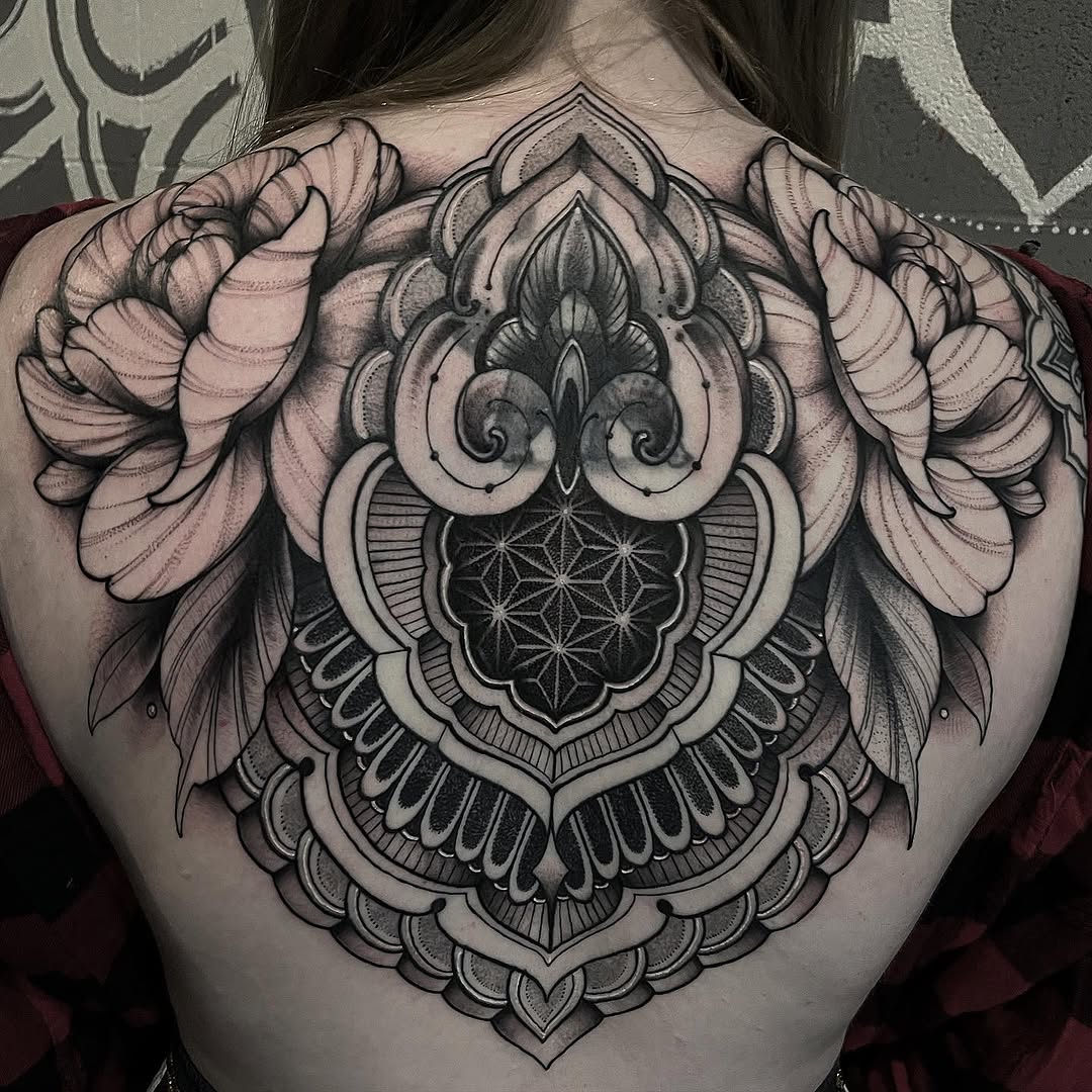 Ornamental mandala with flowers geometric tattoo on the back by Brandon Mola, Chicago, Illinois