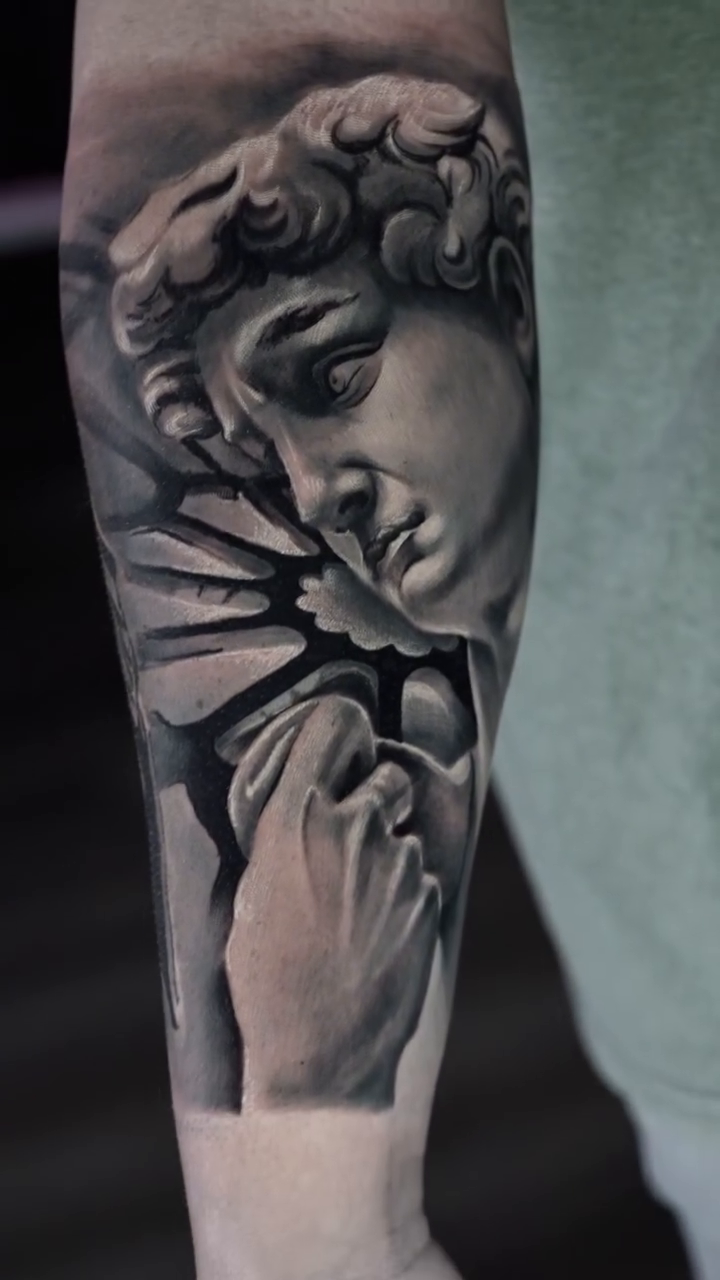Tattoo by @corzo_tattoo_art — realism, black_and_grey