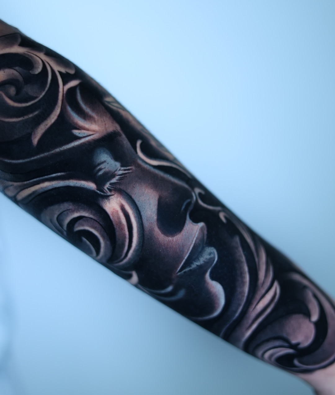 Floral design ornamental tattoo on the forearm by Tiago Ink