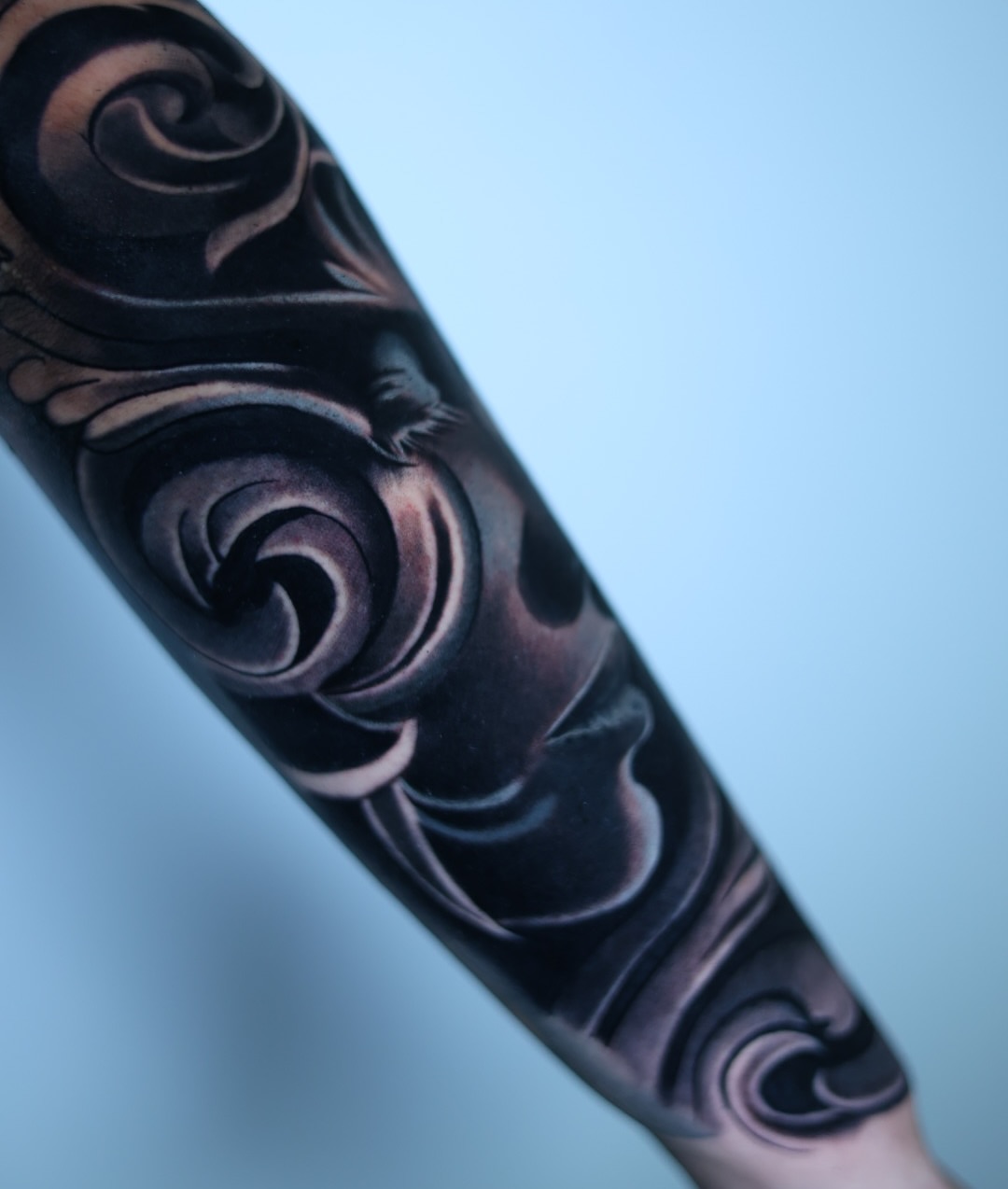 Face black and grey tattoo on the forearm by Tiago Ink