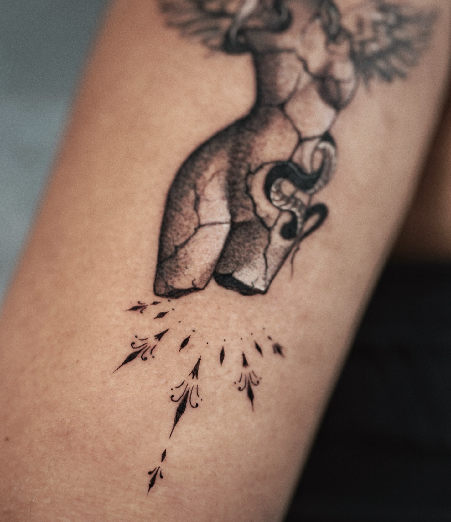 Broken heart dotwork tattoo on the forearm by @katuvetattoo