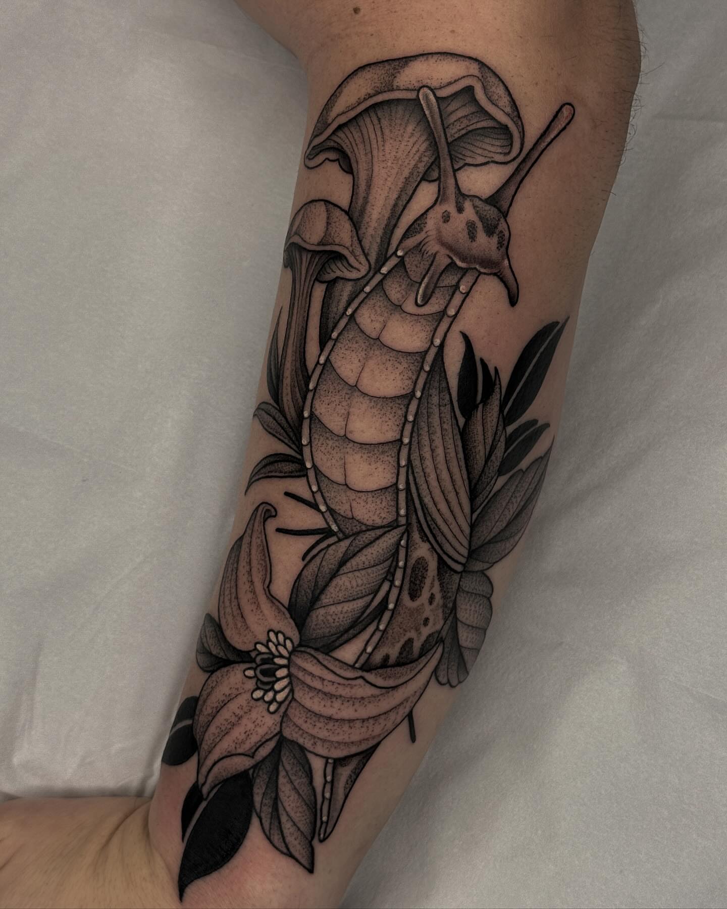 Snail and flowers dotwork tattoo on the forearm by Kyle Stacher - Blackwork Tattoos - Denver