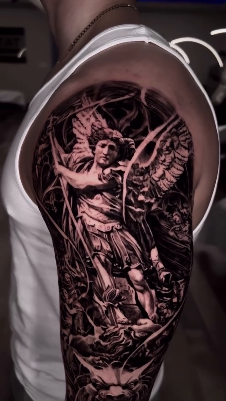 Archangel Michael battling demons realism tattoo by Armando Galán 🇨🇱🇺🇸