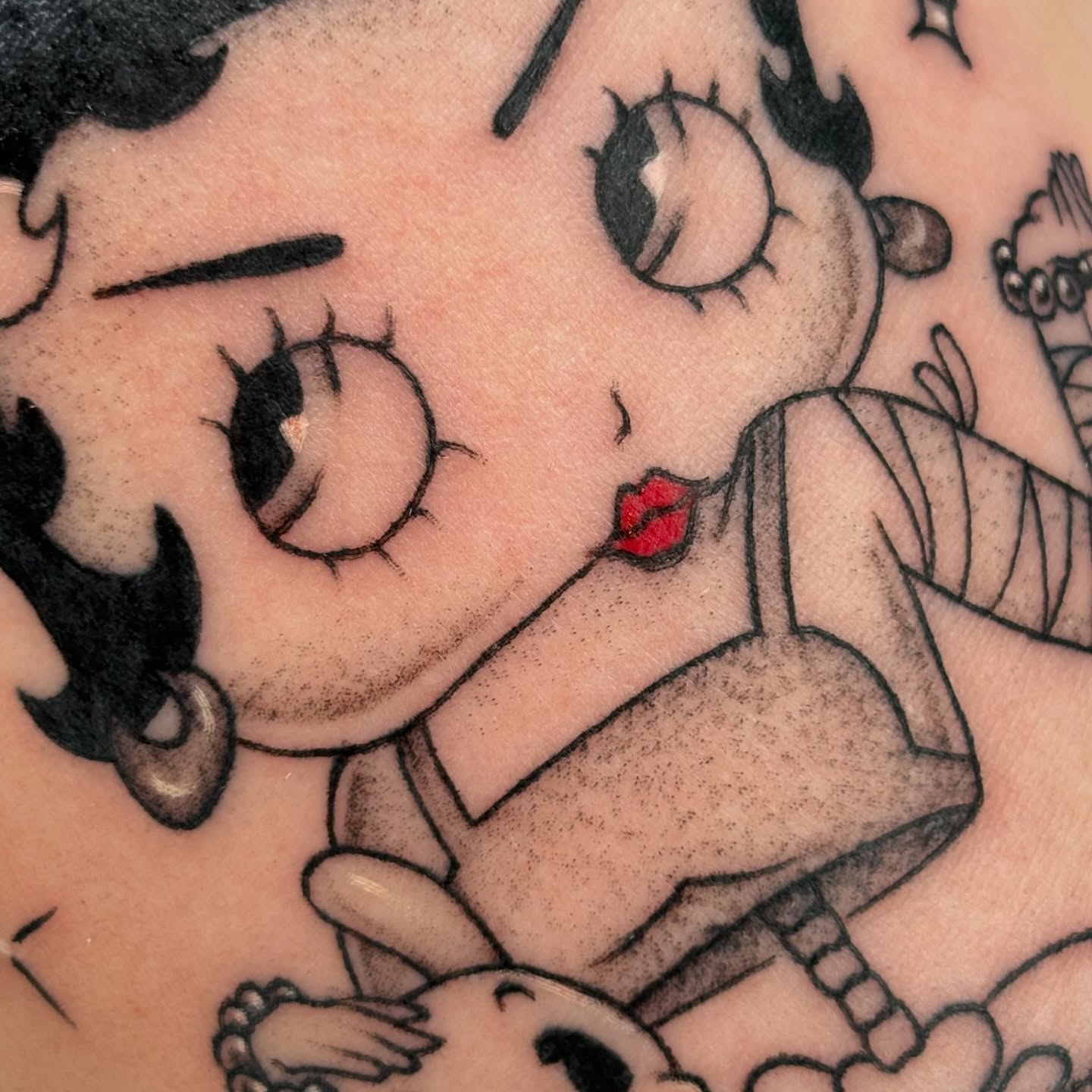 Betty Boop American traditional tattoo on the chest by Júlia Sorrino