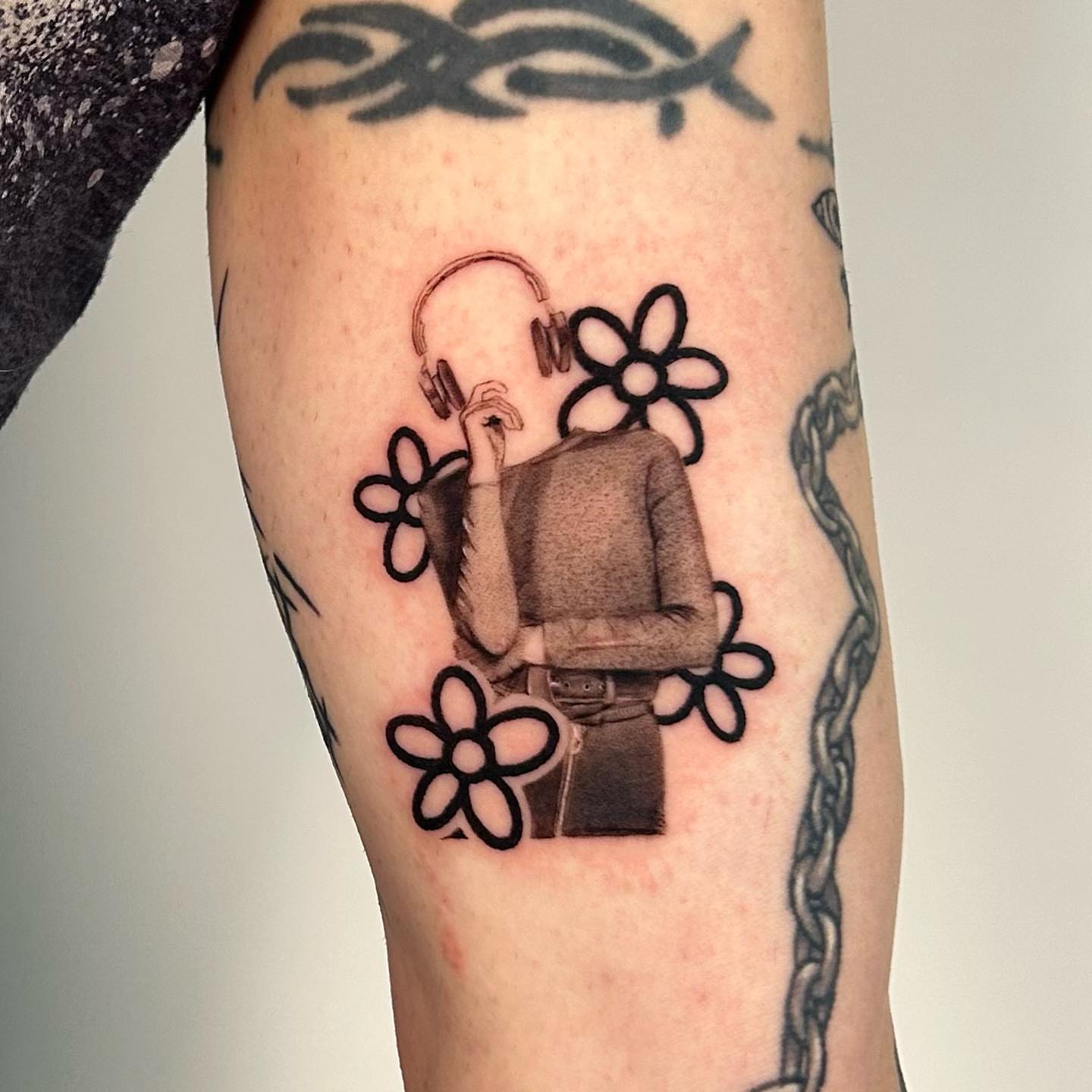 Record player black and grey tattoo on the forearm by Longtea