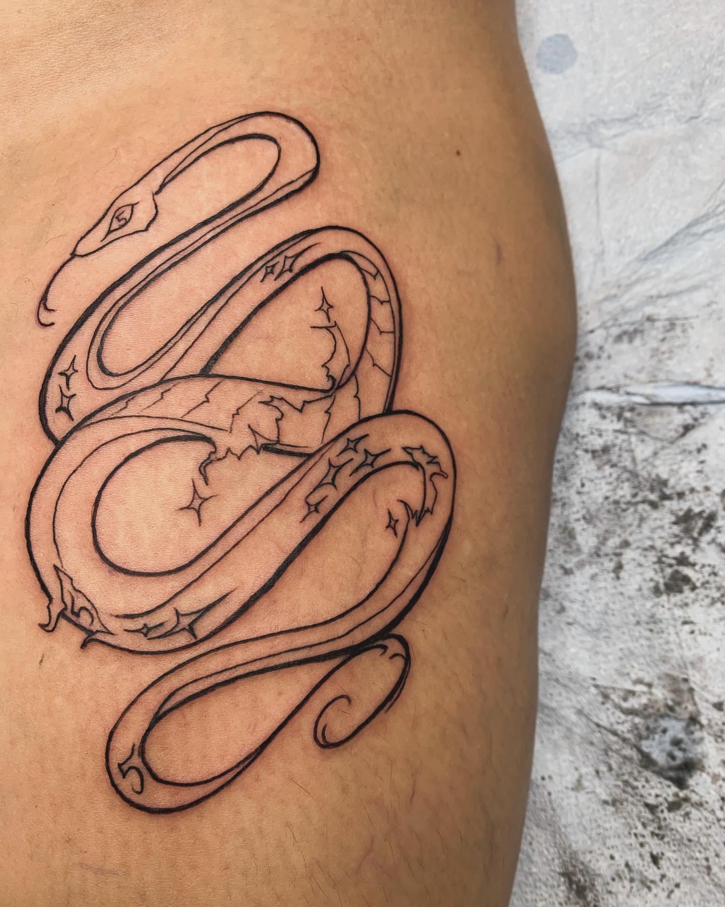 Snake black and grey tattoo on the thigh by @cvpital