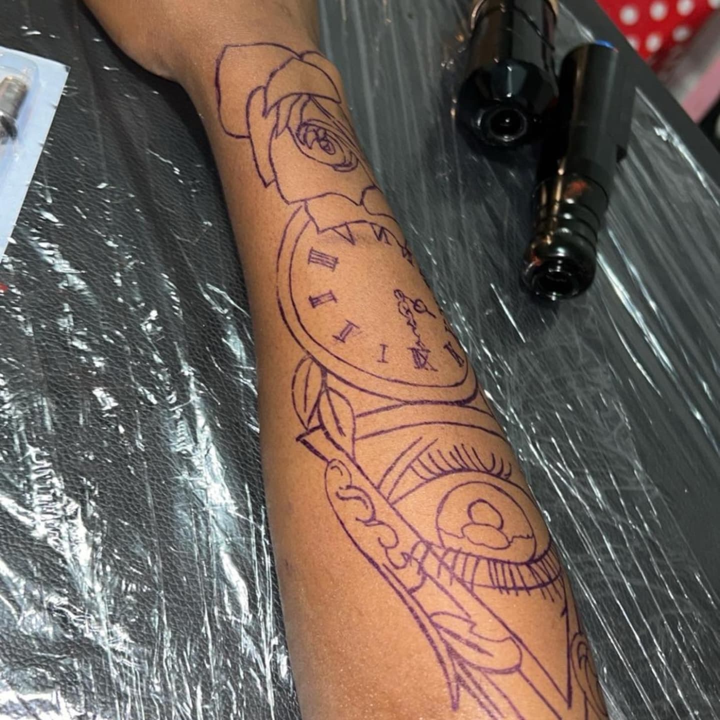 Clock and rose neo-traditional tattoo on the forearm by Trent Johnson