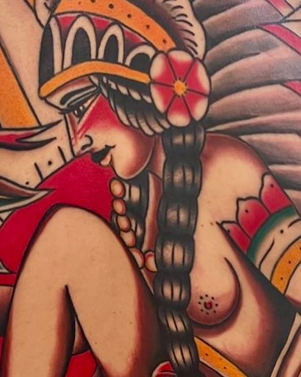 Indian headdress American traditional tattoo on the chest by Massimiliano pennella