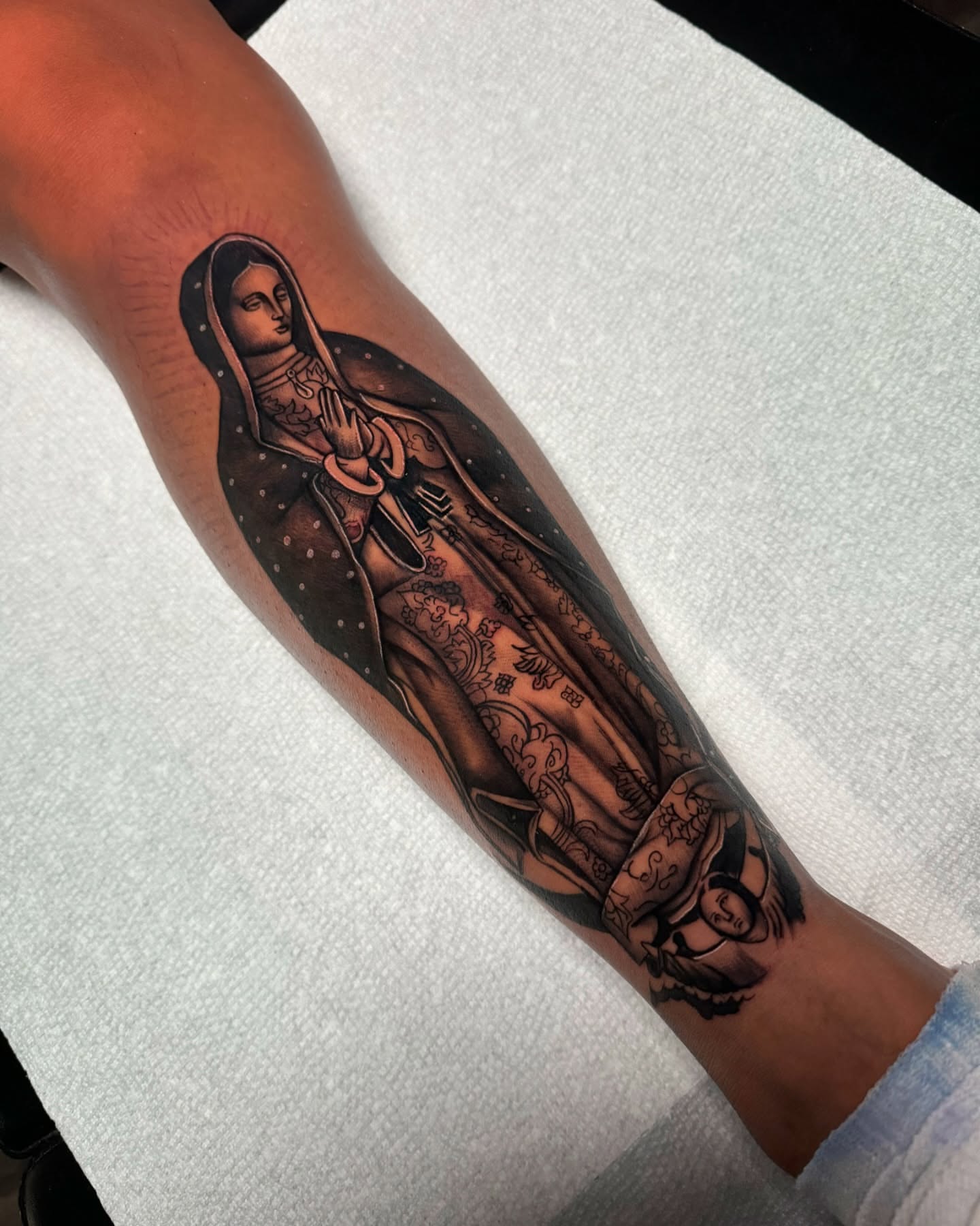 Our Lady of Guadalupe realism tattoo on the forearm by ๐ธ๐๐๐.๐ฎ๐, Los Angeles, California