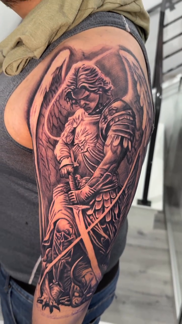Archangel Michael realism tattoo by Rafa