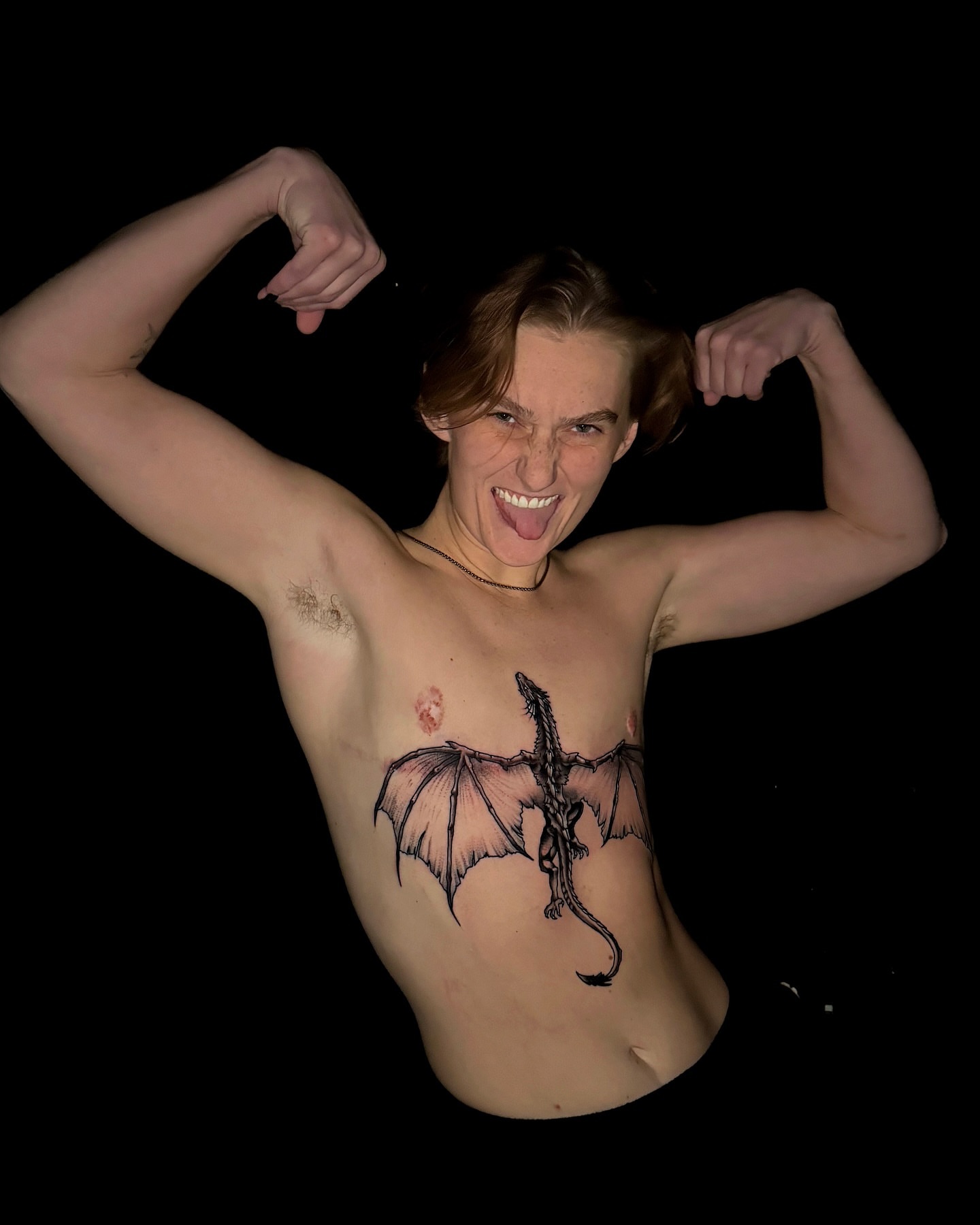 Dragon black and grey tattoo on the chest by Antonio DeCaro
