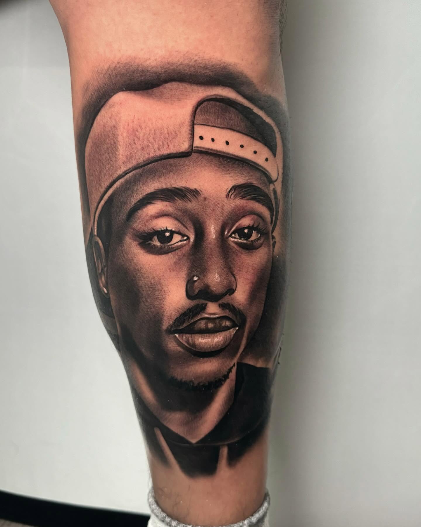Portrait realism tattoo on the forearm by eksoe_