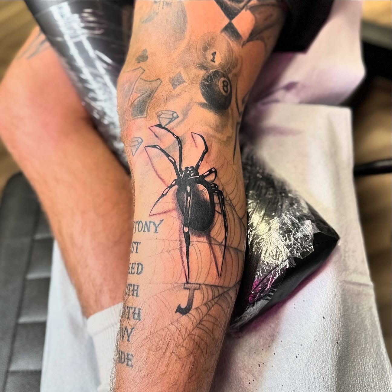 Spider realism tattoo on the forearm by Diana Kunz