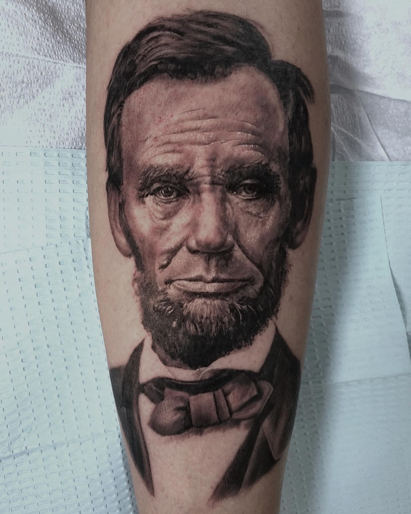 Abraham lincoln realism tattoo on the forearm by Rusty Dornhecker, Columbus, Ohio