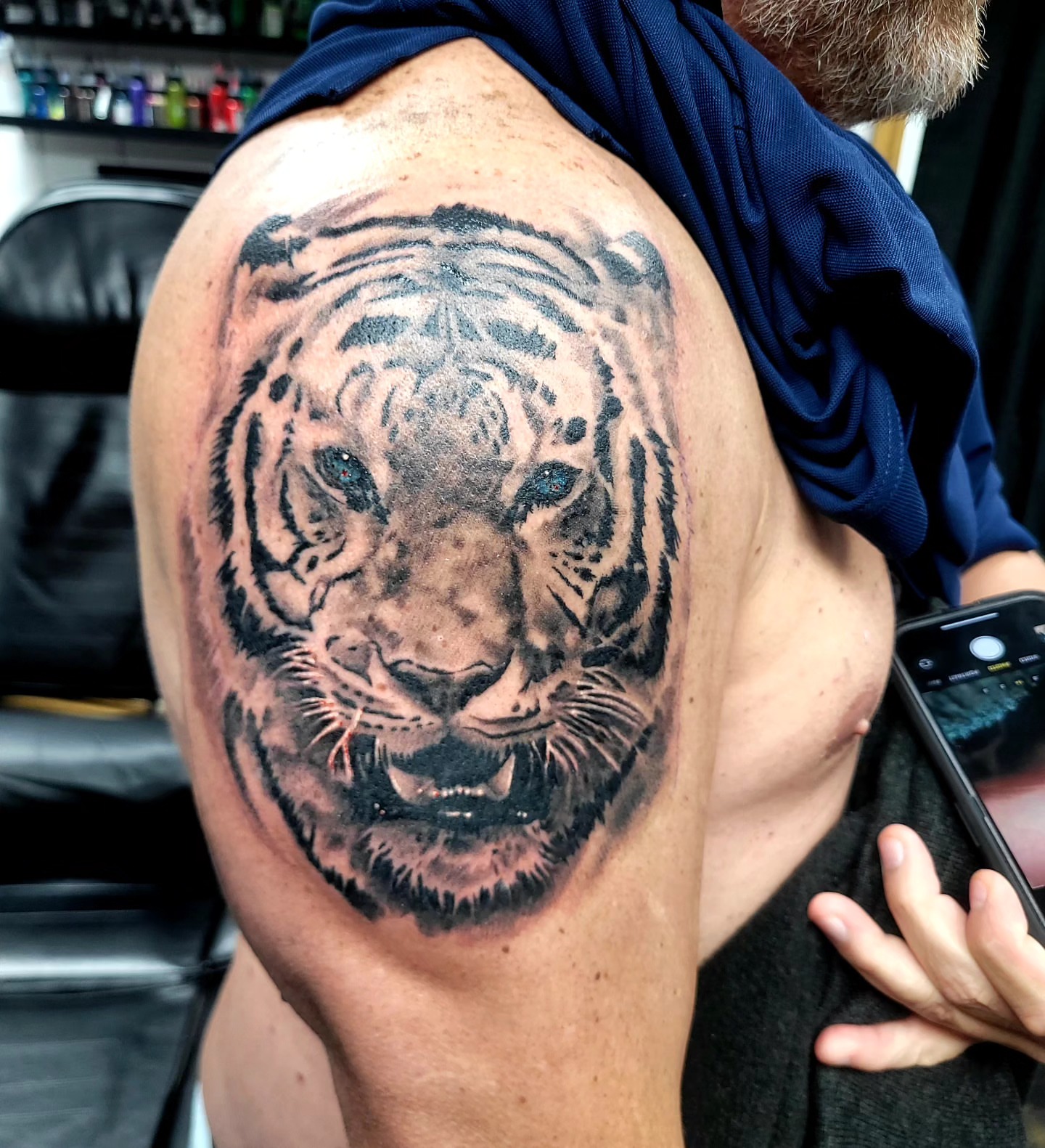 Tiger realism tattoo on the shoulder by Jentrey McCausland