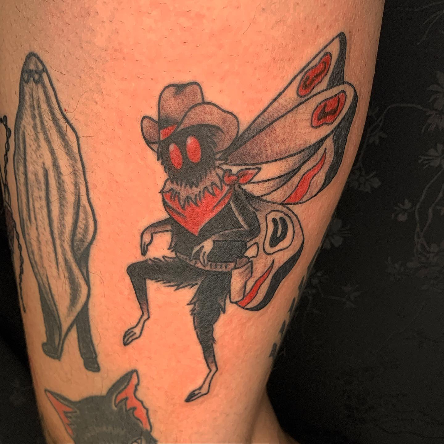 Cowboy moth American traditional tattoo on the forearm by Brii Moser