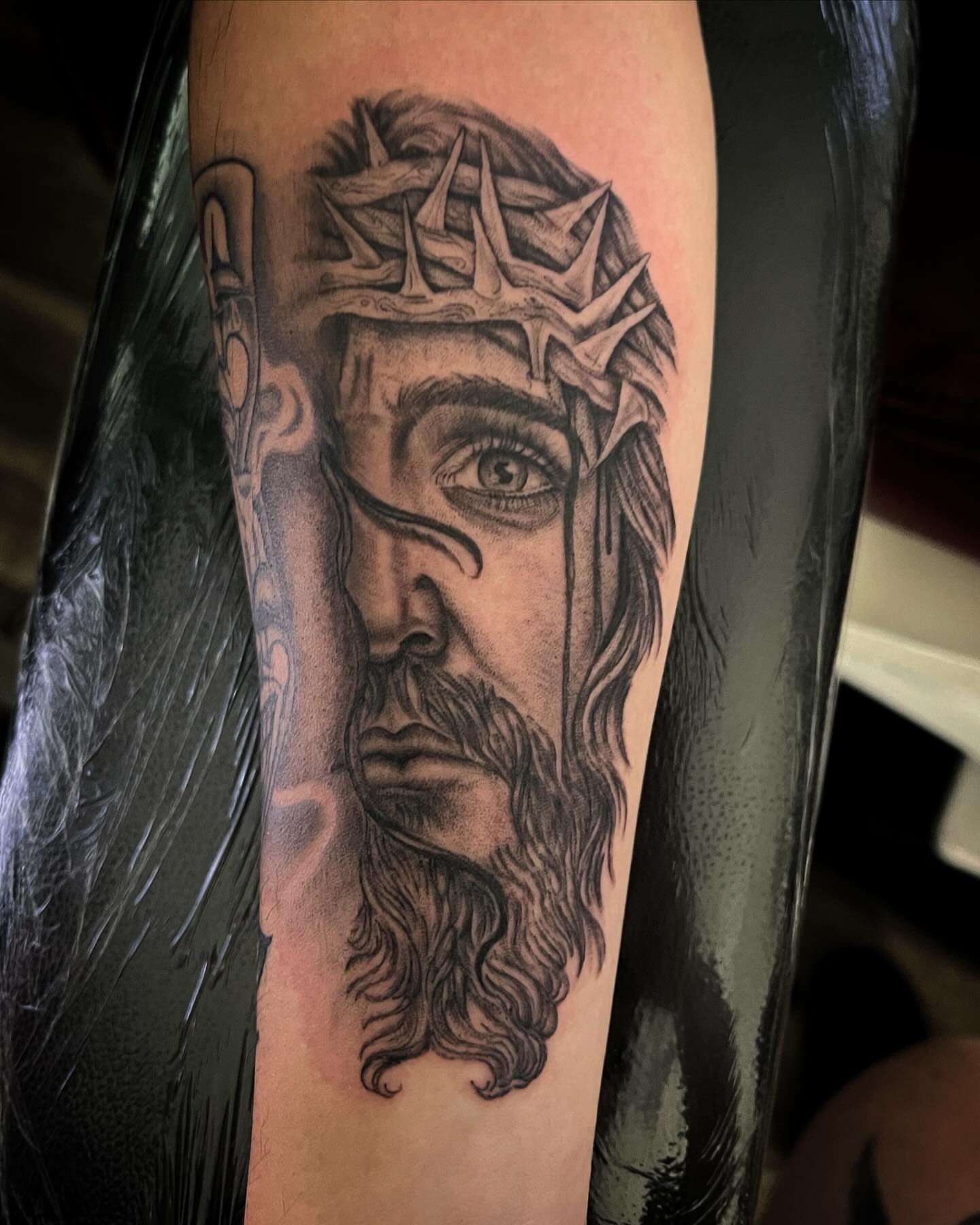 Jesus Christ realism tattoo on the forearm by Iraymi Beltran