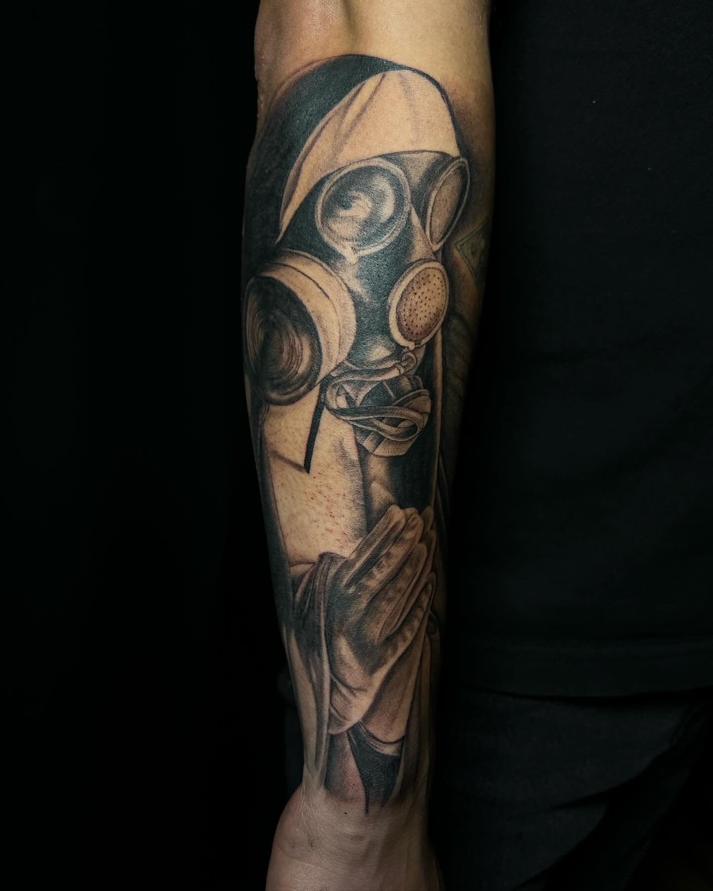 Gas mask realism tattoo on the forearm by Iraymi Beltran