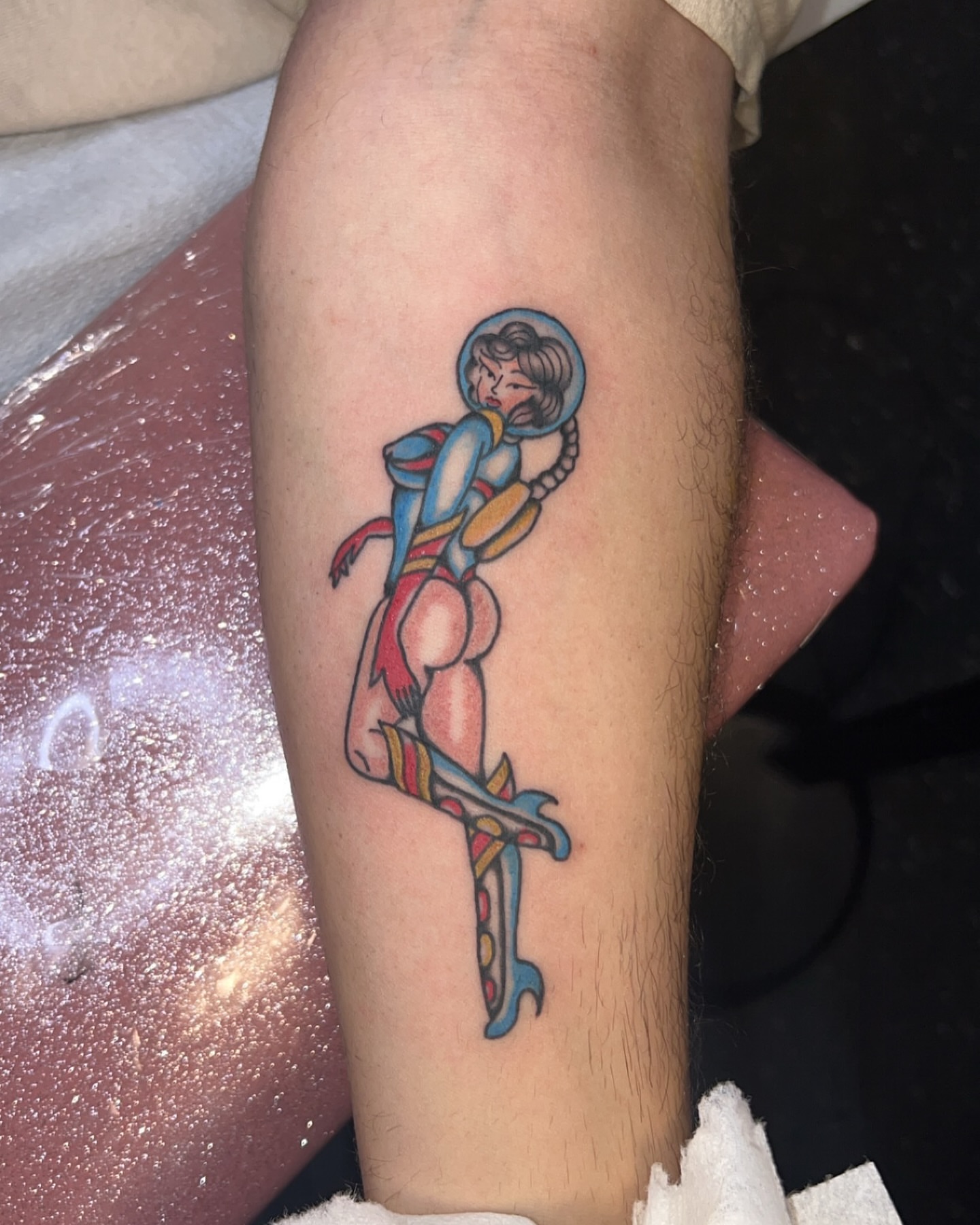 Cosmic pin-up girl new school tattoo on the forearm by Erika Donn, Portland, Oregon