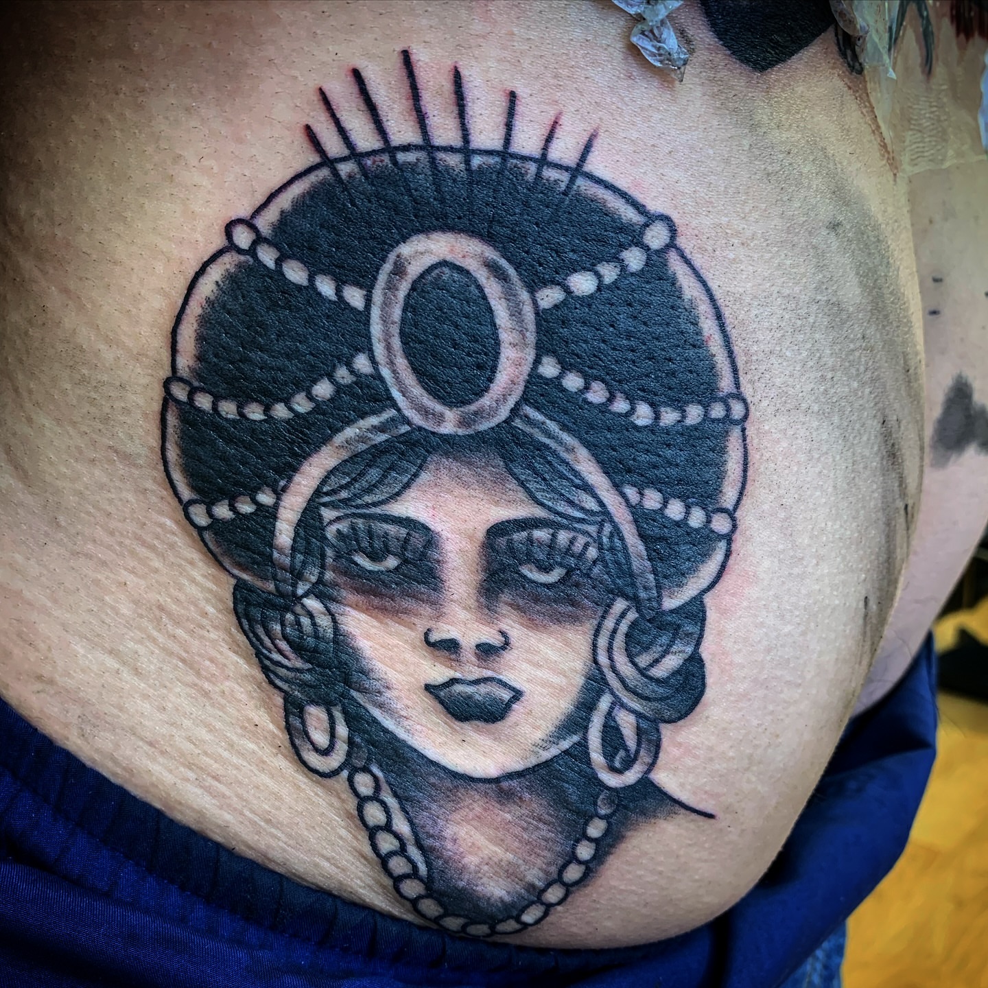 Woman's face black and grey tattoo on the chest by Tattoos Las Vegas,NV