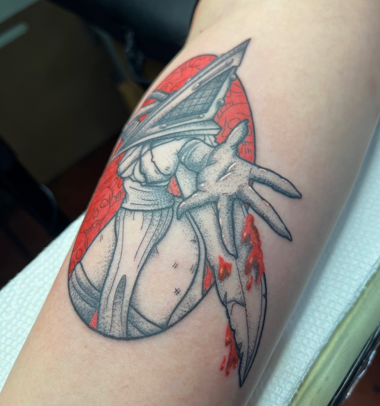 Pyramid warrior dotwork tattoo on the forearm by Taylor Newton
