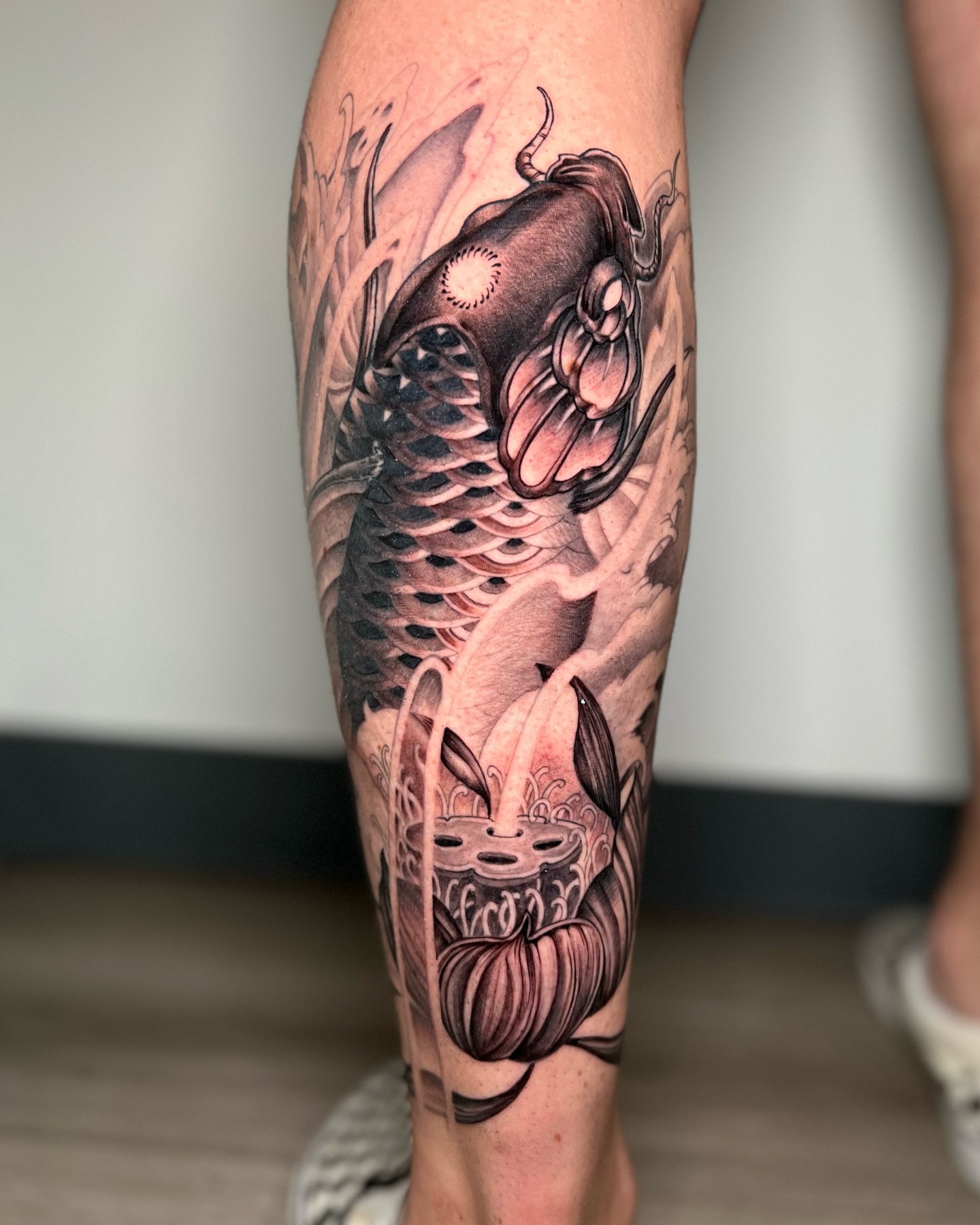 Koi fish japanese irezumi tattoo on the calf by Johnson