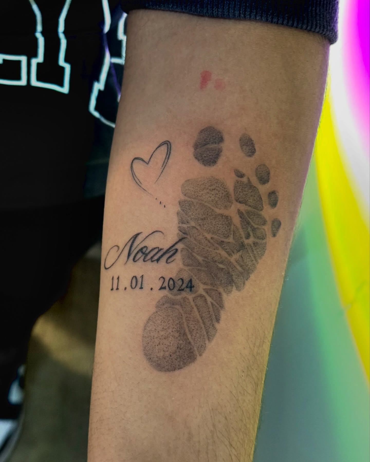 Baby footprint dotwork tattoo on the forearm by Dabbo🩸