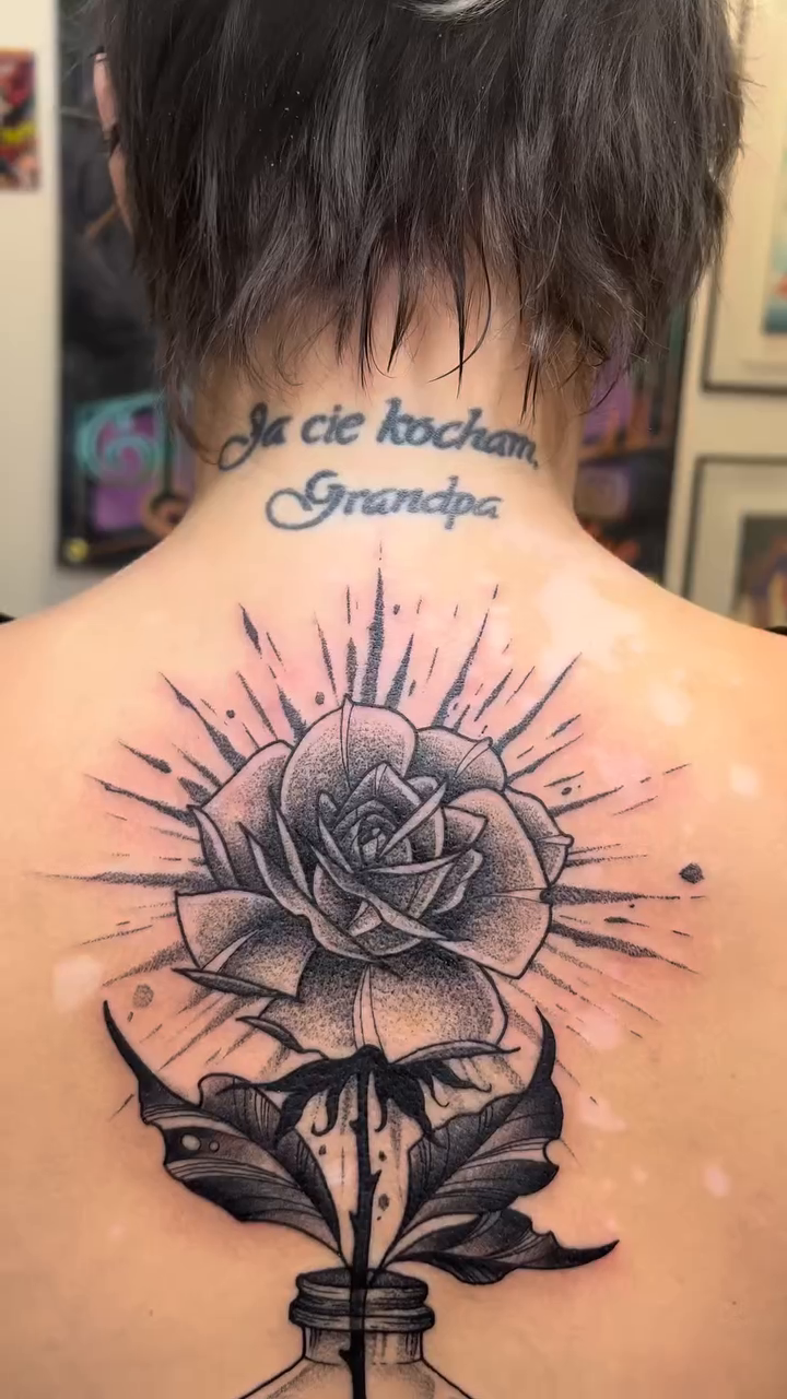 Geometric tattoo on the back by Koryn Donnelly