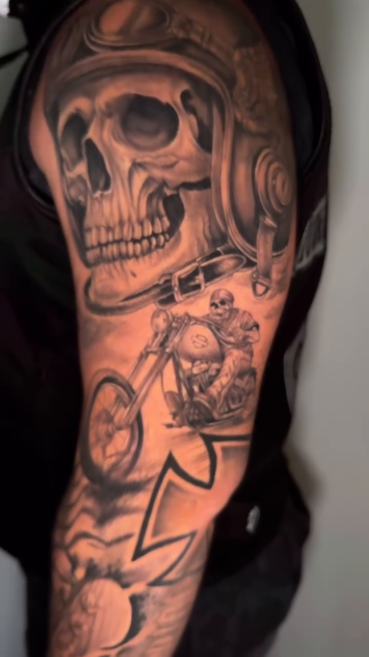 Skull and motorcycle realism tattoo by Tattoo Artist πΊπΈ