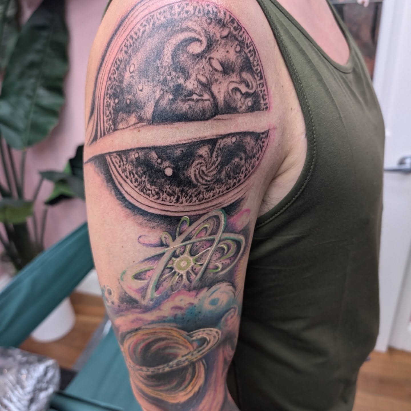 Astronomy dotwork tattoo on the upper arm by Markus Hicks