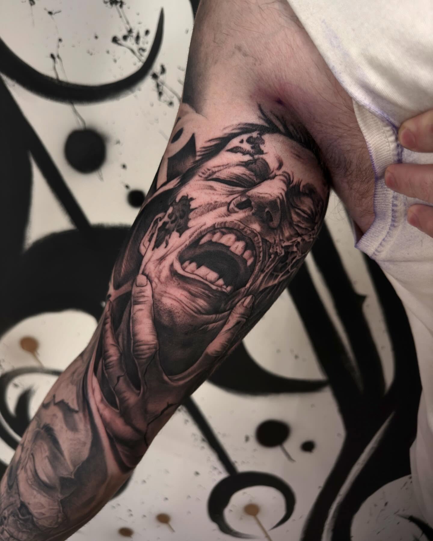 Screaming face realism tattoo on the forearm by Bryan ๐ฅ Loggins, Baton Rouge, Louisiana