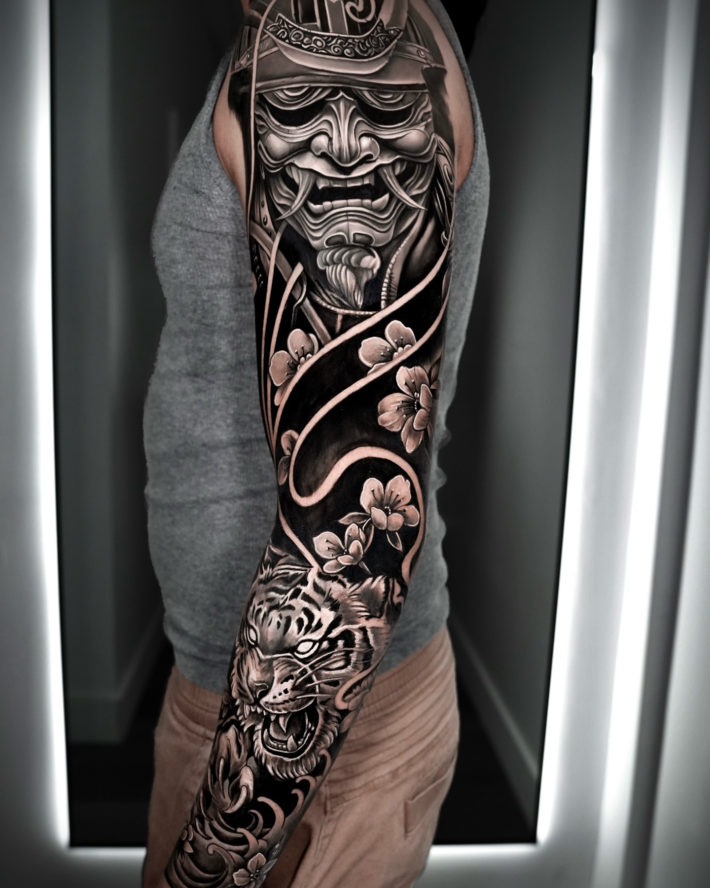 Samurai warrior and tiger realism tattoo on the forearm by Gabriel Garcia