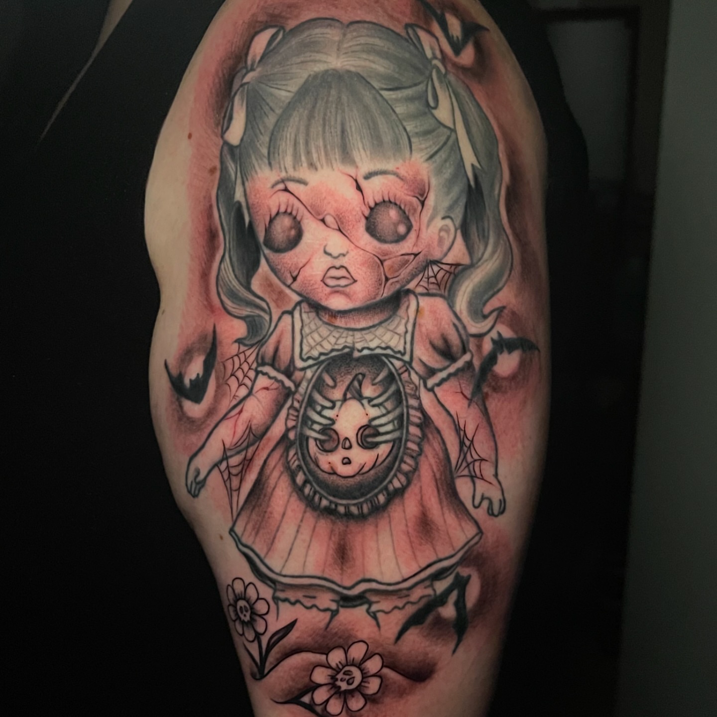 Doll dark realism tattoo on the forearm by Alex