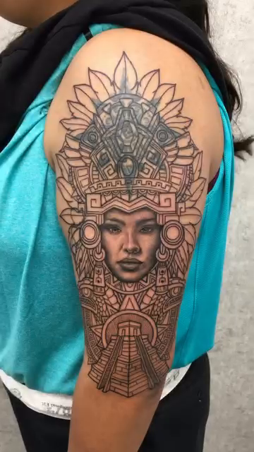 Aztec warrior woman realism tattoo on the upper arm by Joshua Shawn