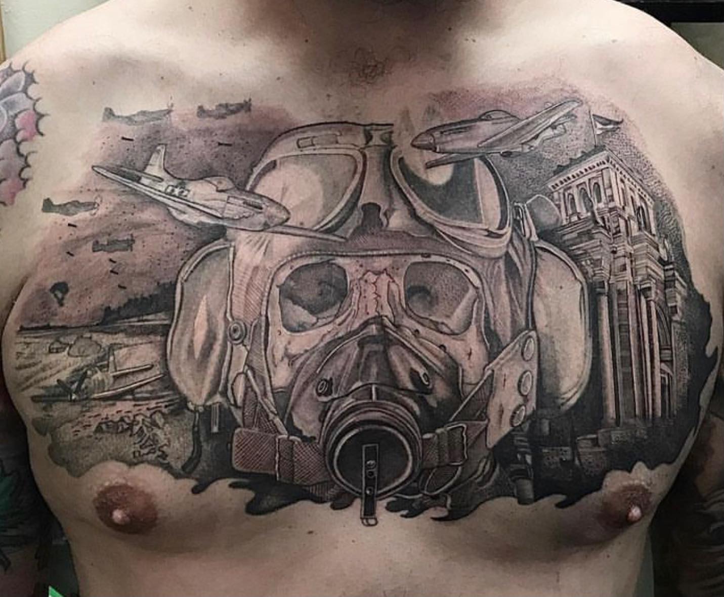 Gas mask realism tattoo on the chest by Sean Hollinger