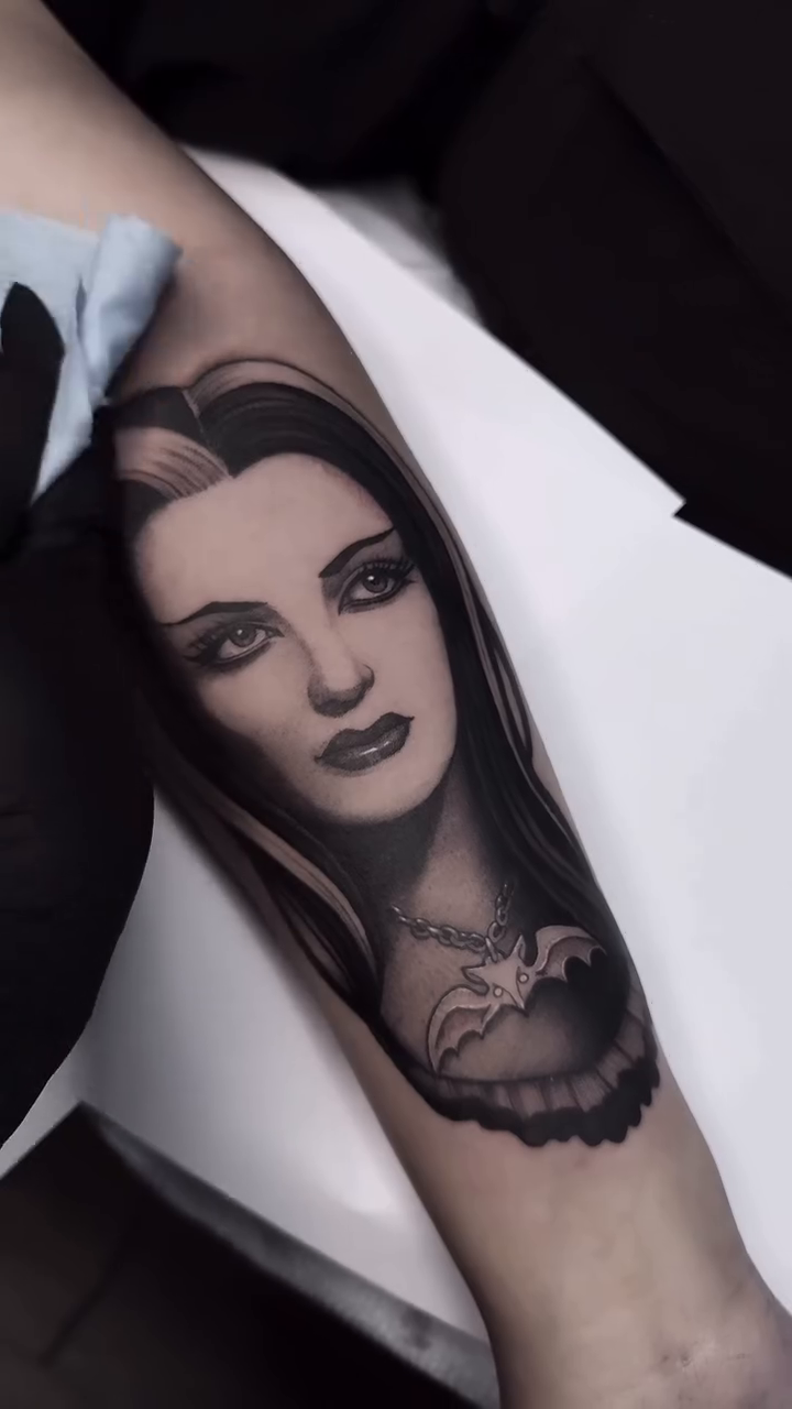 Morticia Addams portrait realism tattoo by Luna Lucero