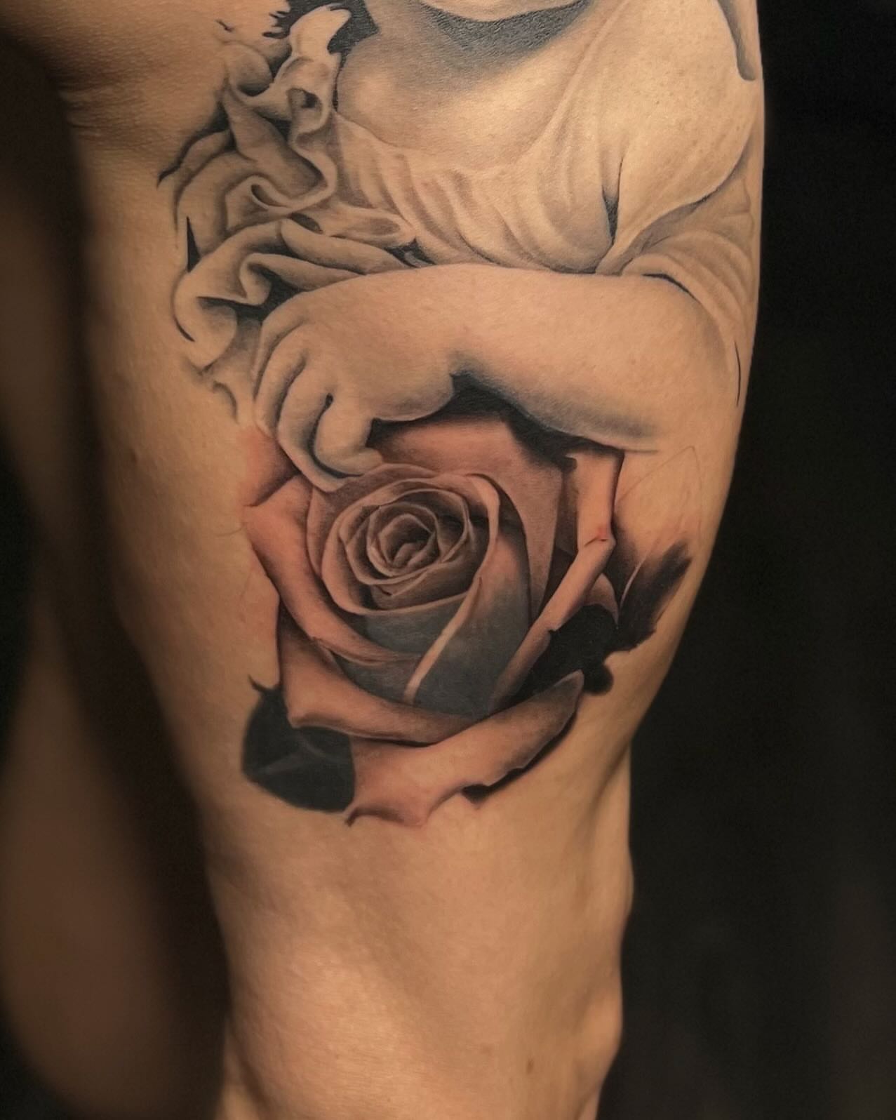 Rose realism tattoo on the thigh by π΄πππ