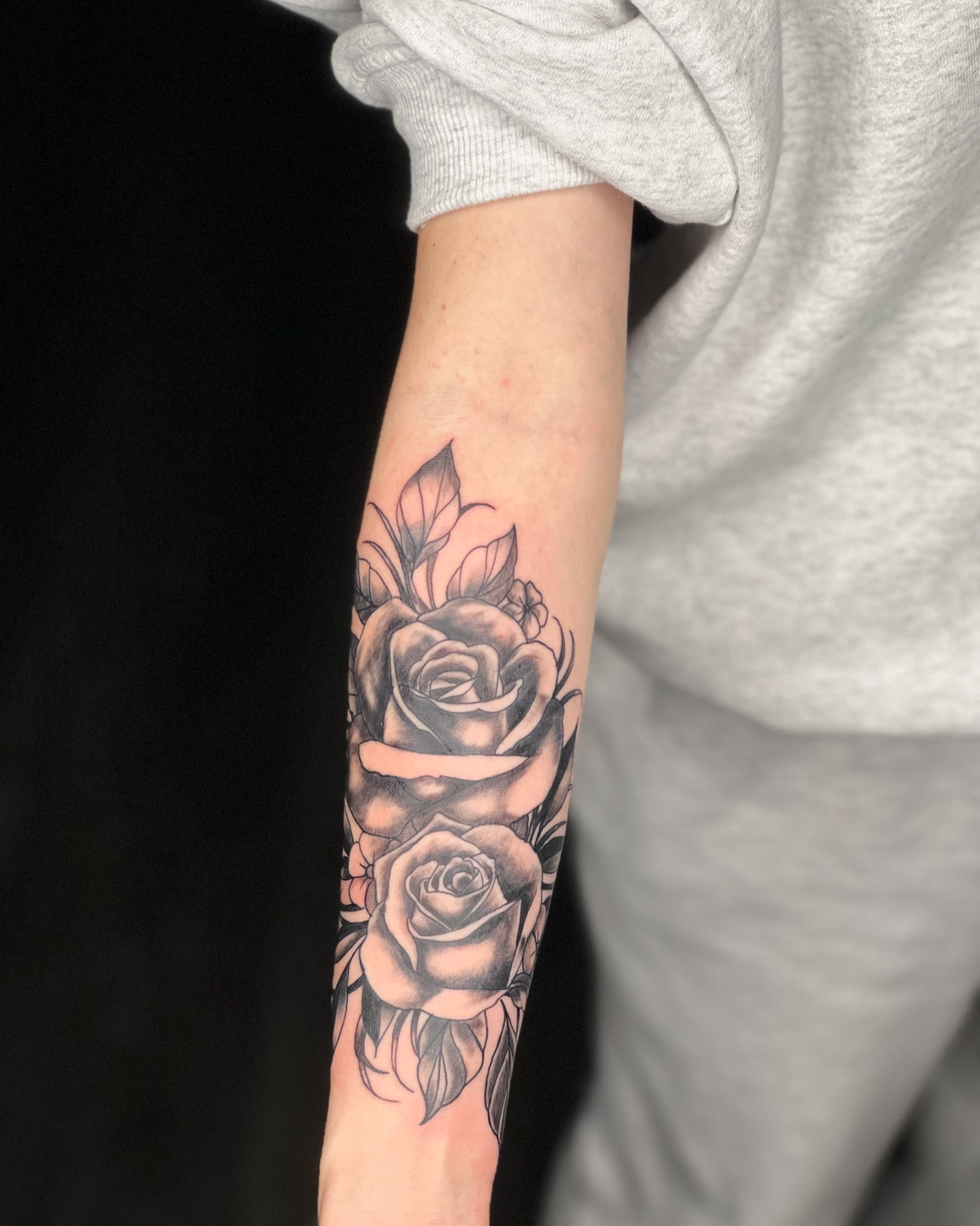 Roses black and grey tattoo on the forearm by Emac, Baltimore, Maryland