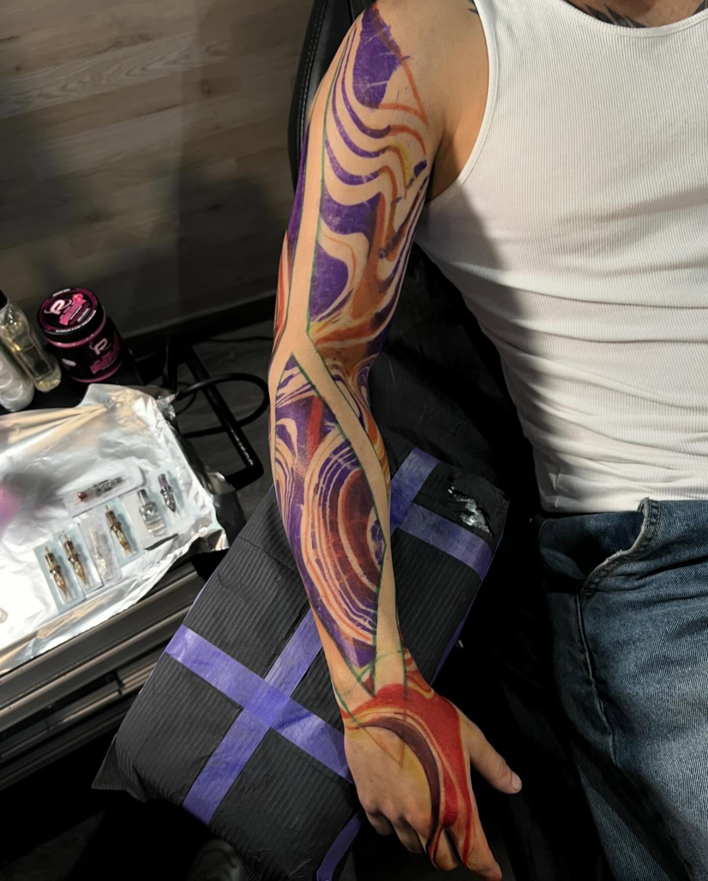 Abstract swirls dotwork tattoo on the upper arm by Jess