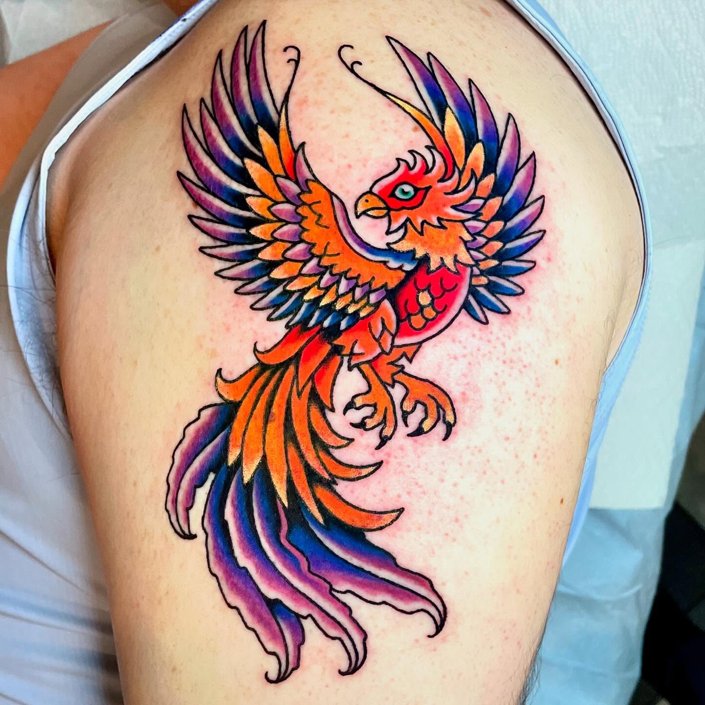 Phoenix new school tattoo on the shoulder by Nova Vaughn