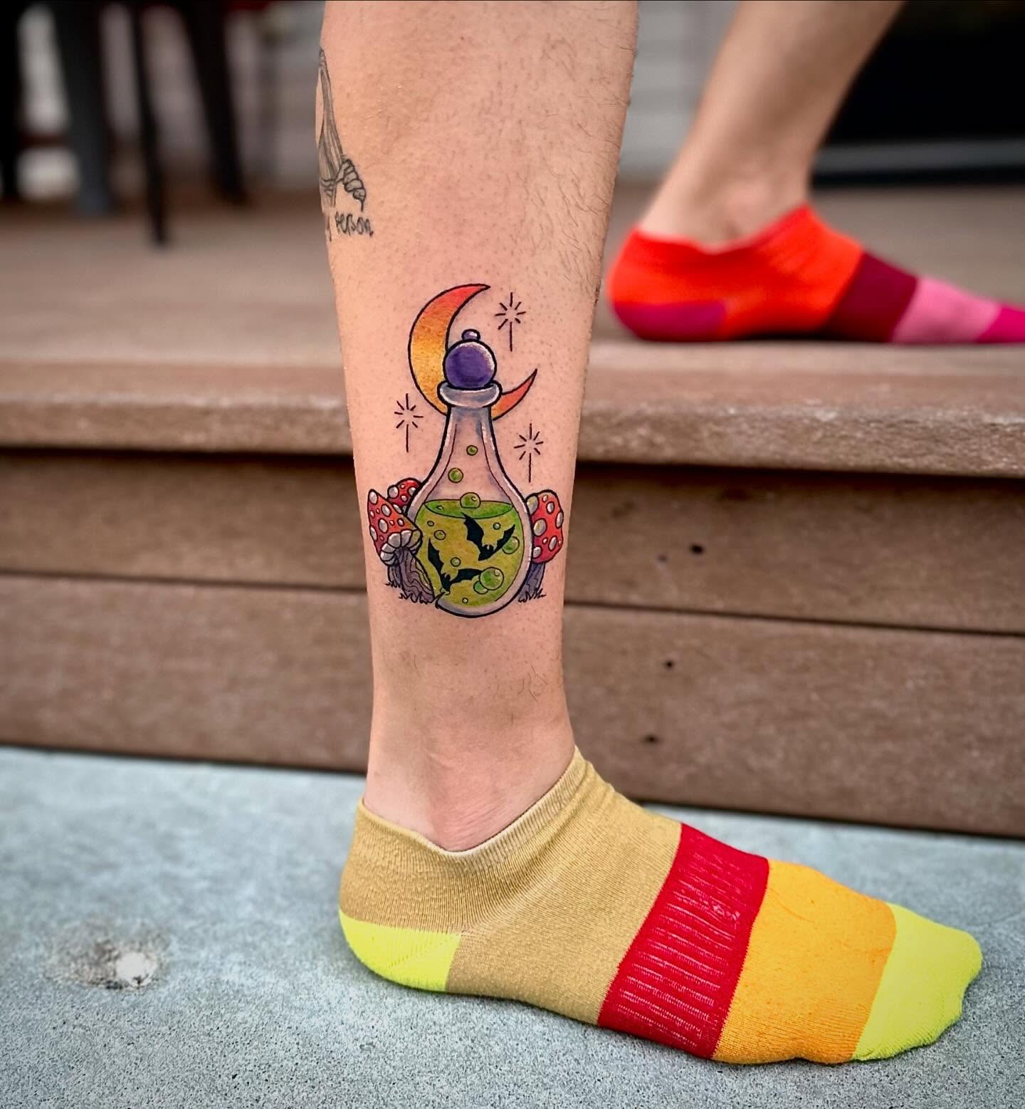Bottle with mushrooms dotwork tattoo on the calf by manda, Lebanon, Ohio
