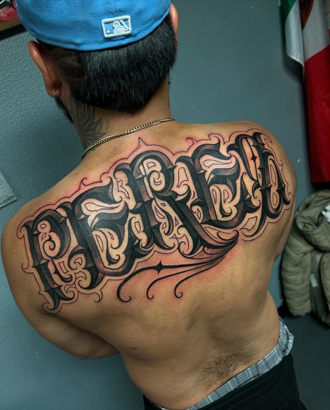 Tattoo by @smukonetattoos — lettering_script, chicano